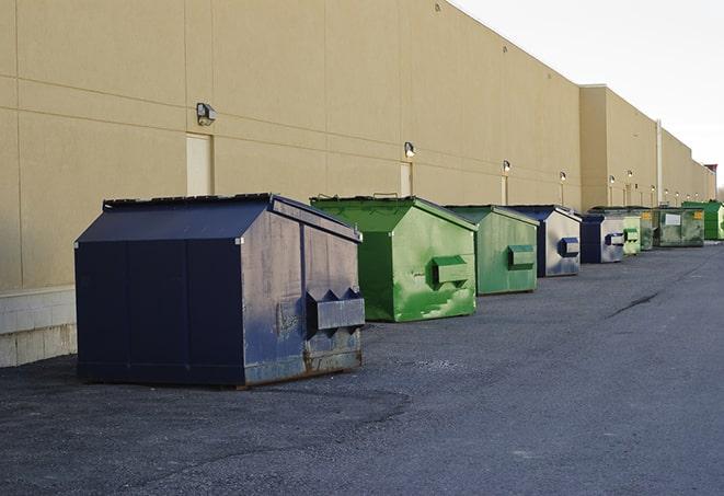 overhead shot of filled construction dumpsters in Allston